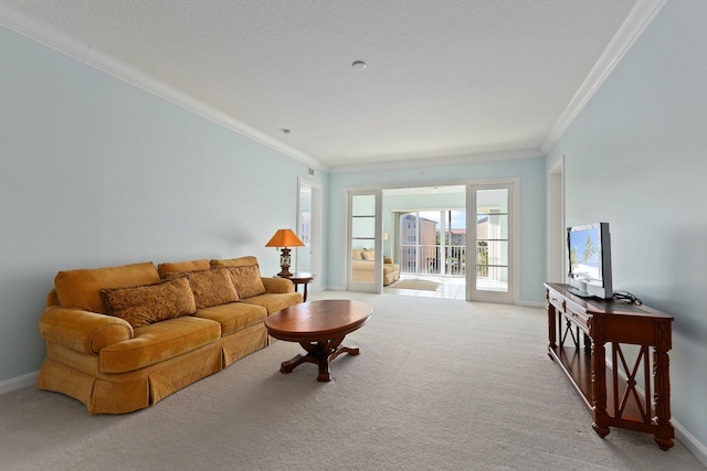 living room featuring light carpet, a textured ceiling, and ornamental molding