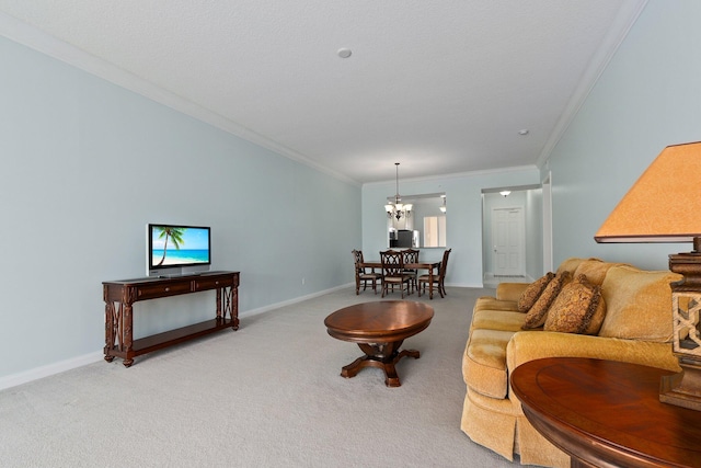 carpeted living room with a notable chandelier and ornamental molding