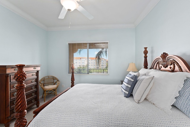 bedroom featuring ceiling fan, carpet floors, and crown molding