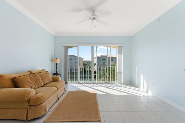 tiled living room with ceiling fan and crown molding