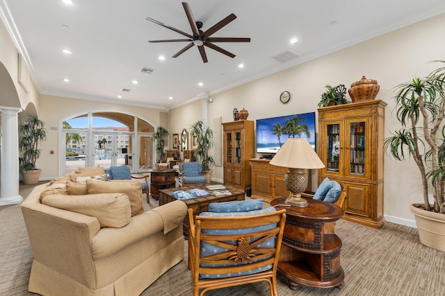 living room featuring decorative columns, light colored carpet, ornamental molding, ceiling fan, and french doors