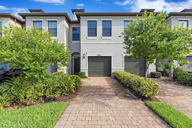 view of front of property featuring a garage