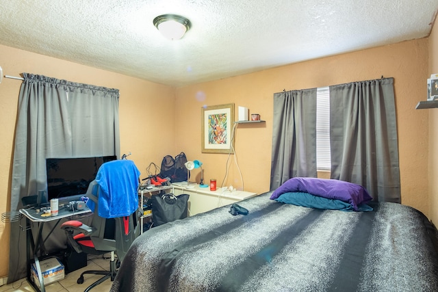 bedroom with a textured ceiling