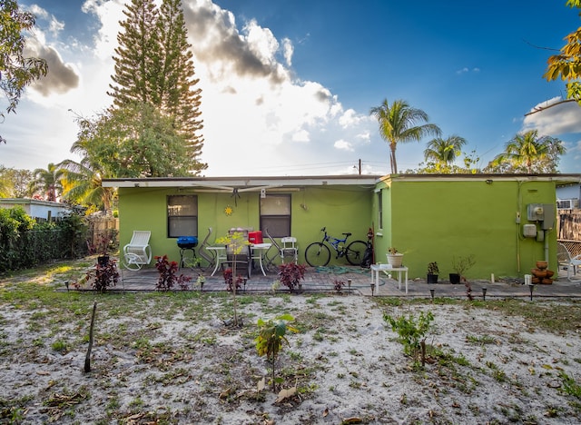 rear view of house featuring a patio area