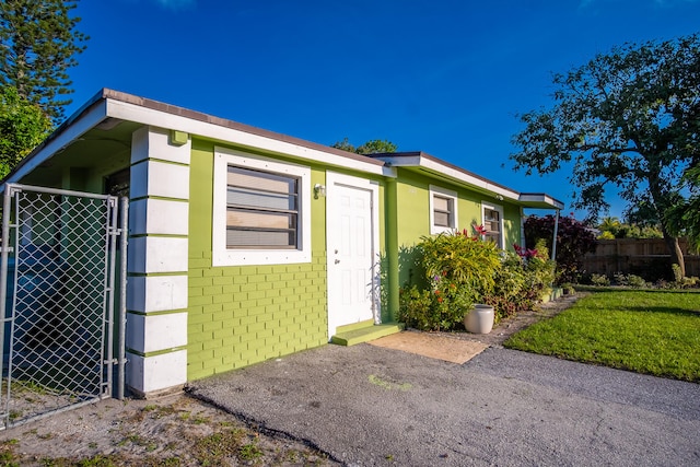 exterior space with a front yard