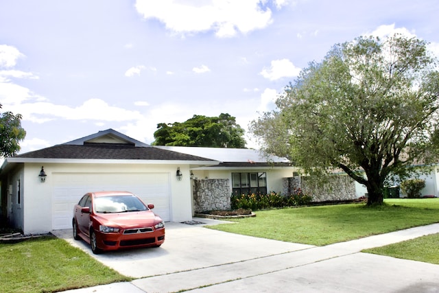 ranch-style house with a front lawn and a garage