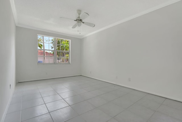 empty room featuring a textured ceiling, ceiling fan, light tile patterned floors, and crown molding