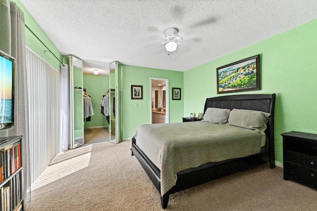 carpeted bedroom featuring access to exterior, ceiling fan, and a textured ceiling