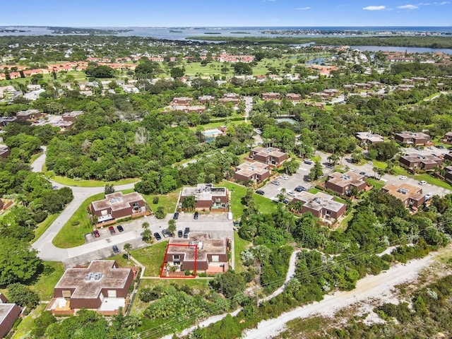 bird's eye view with a water view