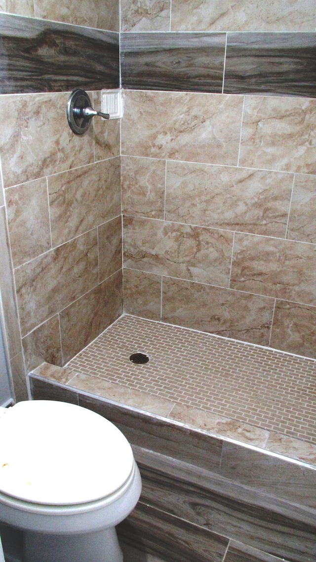 bathroom featuring a stall shower