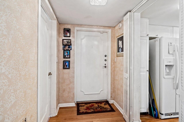 entryway featuring hardwood / wood-style flooring