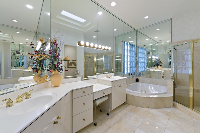 bathroom featuring separate shower and tub and vanity