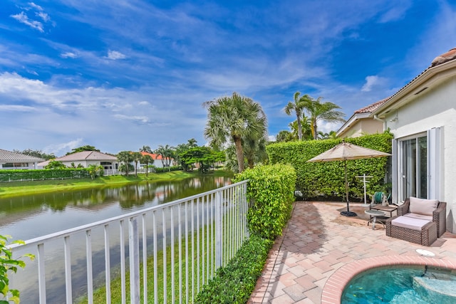 view of patio / terrace with a water view