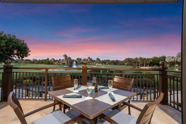 patio terrace at dusk with a balcony