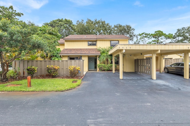 view of front of property with a carport