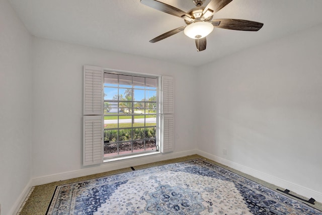 unfurnished room with ceiling fan