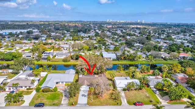 drone / aerial view with a water view