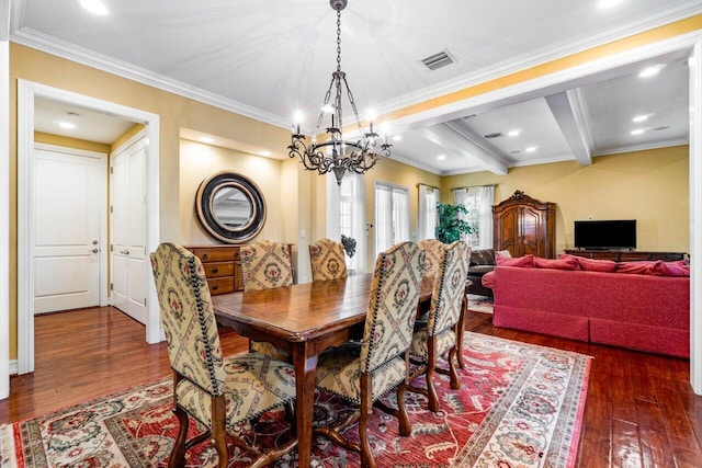 dining area featuring dark wood-type flooring, a chandelier, beam ceiling, and crown molding