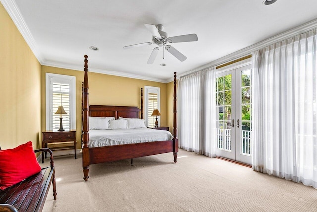 bedroom with french doors, crown molding, access to exterior, light colored carpet, and ceiling fan