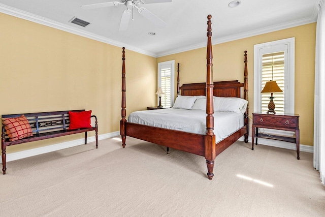 bedroom featuring ceiling fan, crown molding, and carpet