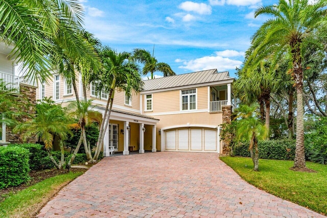 view of front of property featuring a garage