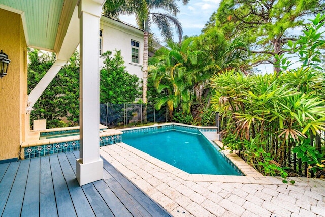 view of pool with a deck