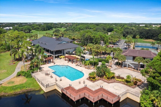 view of swimming pool with a patio area