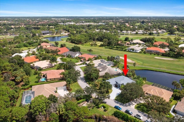 bird's eye view with golf course view, a residential view, and a water view