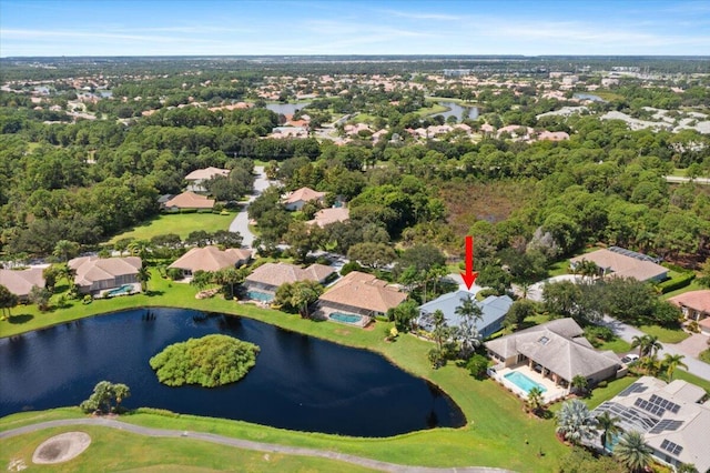birds eye view of property with a residential view and a water view