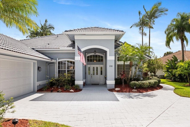 view of front of home with a garage