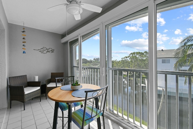 interior space featuring ceiling fan