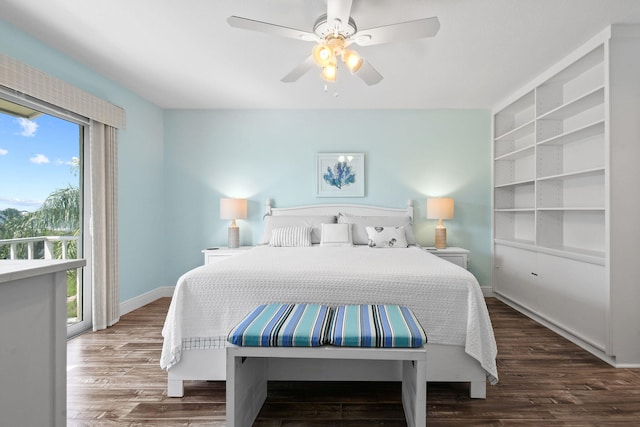 bedroom with ceiling fan and dark hardwood / wood-style floors