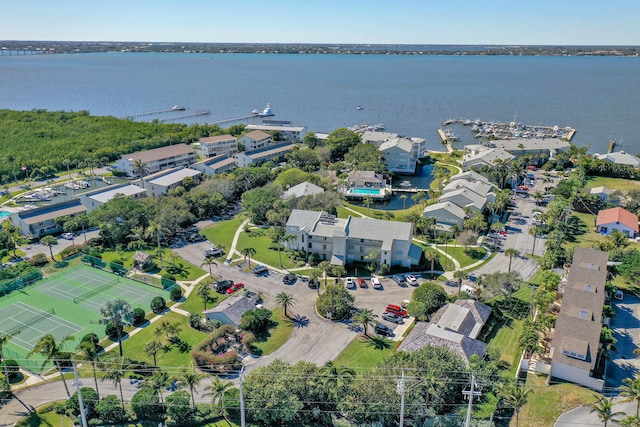 drone / aerial view with a water view