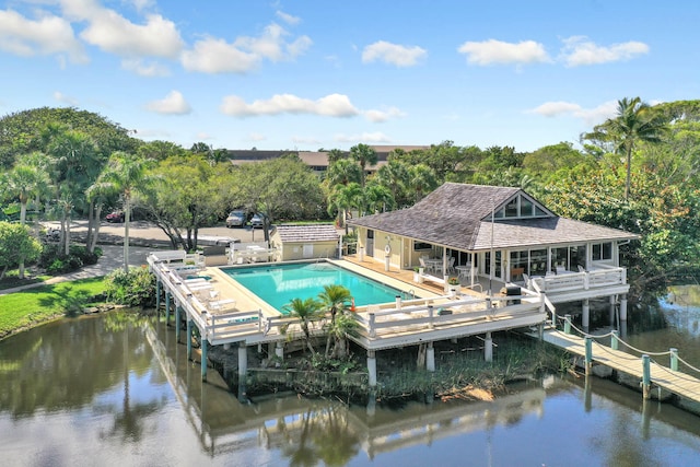 view of dock featuring a water view and a patio area