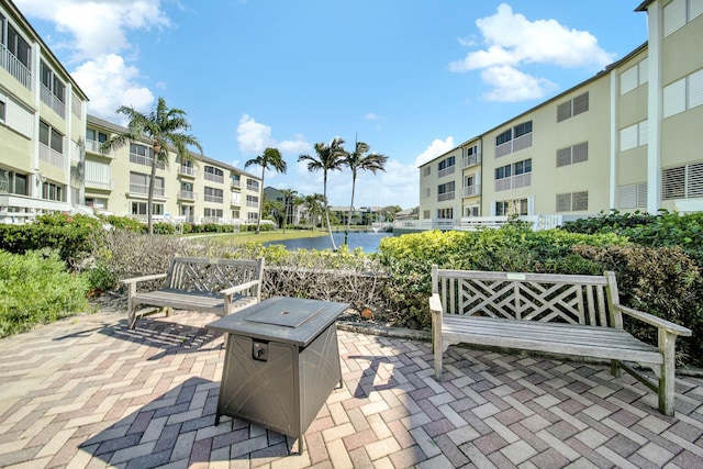 view of patio / terrace featuring a water view