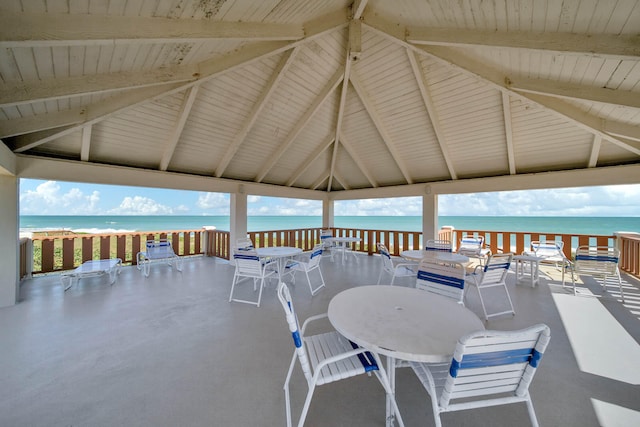 view of patio / terrace featuring a water view and a gazebo