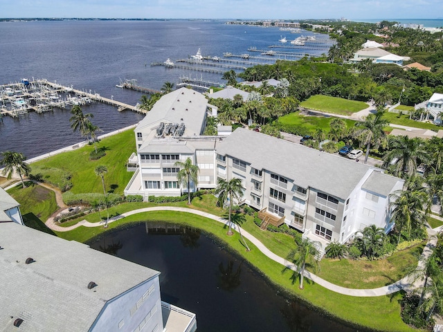 birds eye view of property featuring a water view