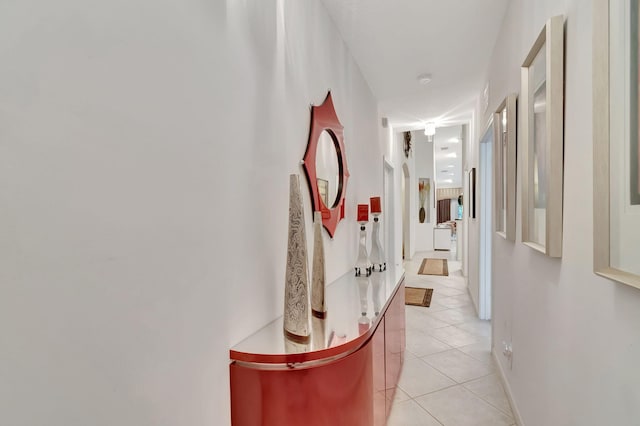 corridor with light tile patterned floors