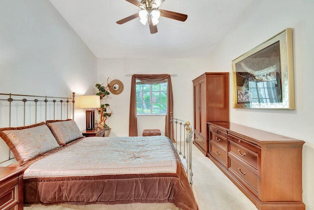 bedroom with ceiling fan and light colored carpet