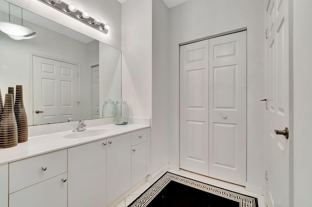 bathroom featuring vanity and tile patterned flooring