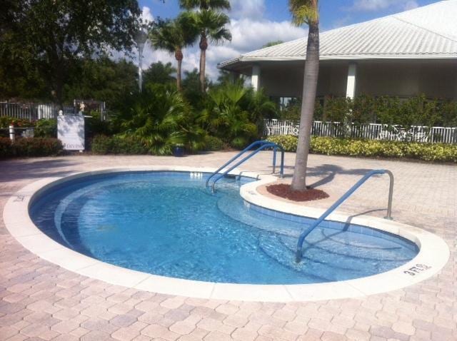 view of swimming pool featuring a patio