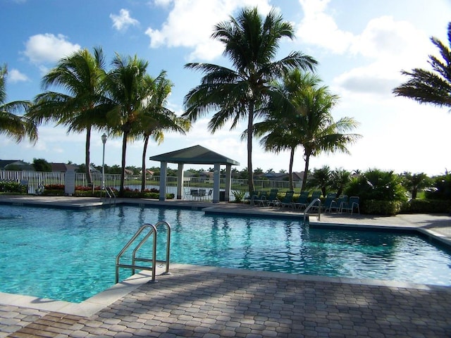 view of swimming pool with a gazebo and a patio