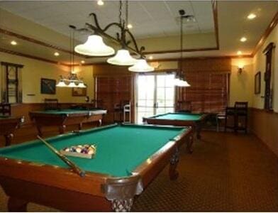 recreation room with billiards and dark carpet