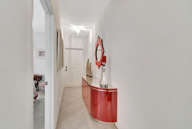 corridor with light tile patterned floors