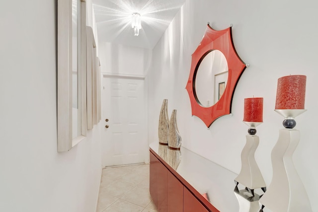 corridor with light tile patterned floors