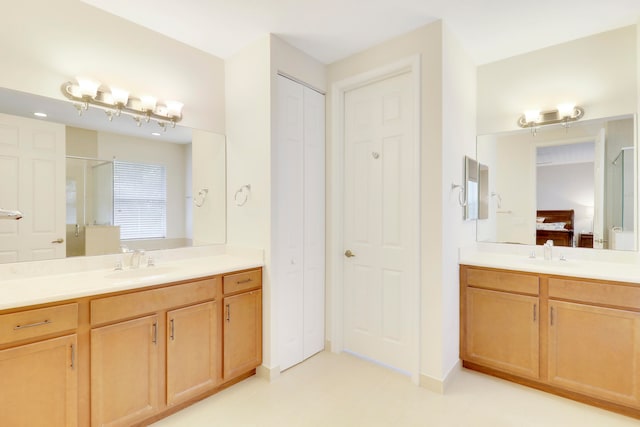 bathroom featuring vanity and walk in shower