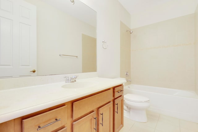 full bathroom with tile patterned flooring, vanity, tiled shower / bath combo, and toilet