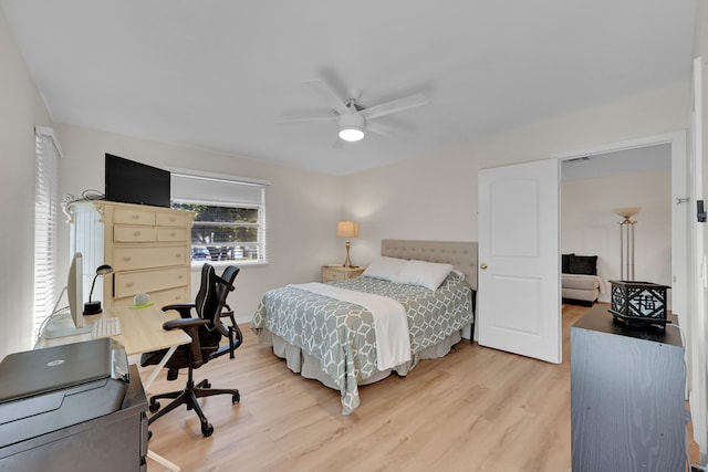 bedroom featuring wood-type flooring and ceiling fan