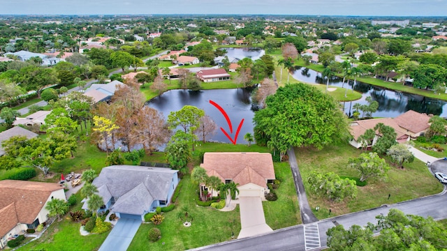 drone / aerial view featuring a water view