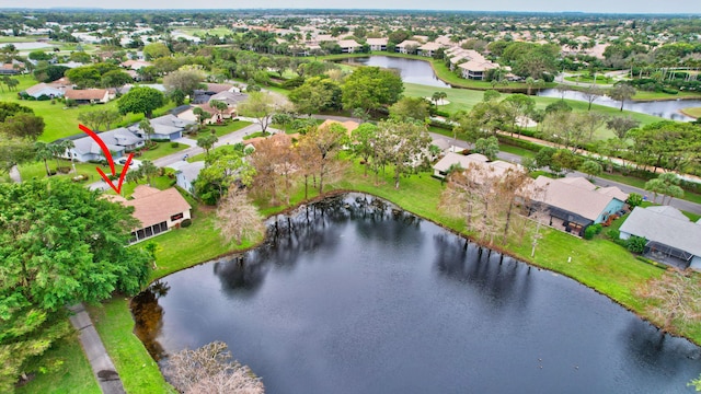 bird's eye view with a water view